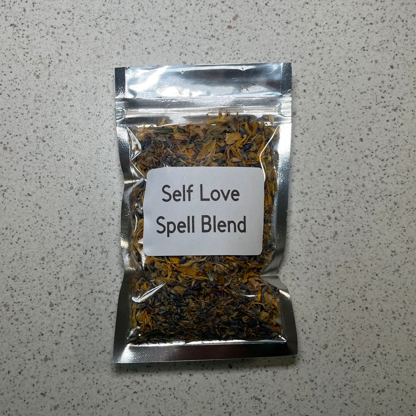 Self love herb blend in a clear bag