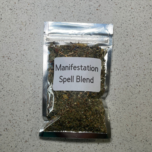 Packaged 'Manifestation Spell Blend' on a gray surface