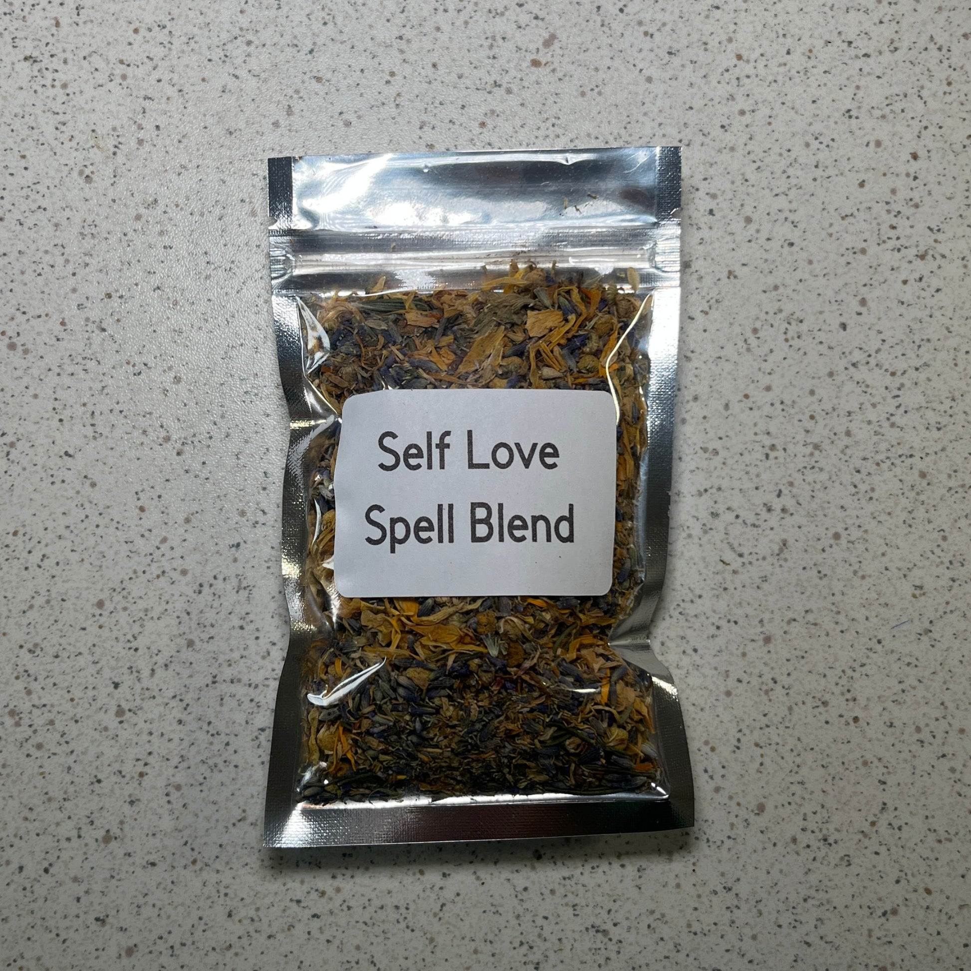 Self love herb blend in a clear bag